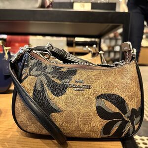 Coach Black and Tan Bow bag mini Terri